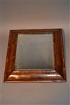 A William and Mary cushion walnut frame mirror.