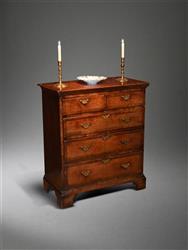 A George III oak chest of drawers. 