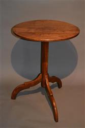 An unusual George III fruitwood tripod table.