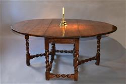 A large Charles II walnut gateleg table.