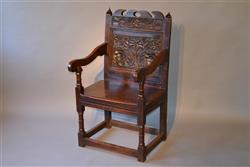 A North Country Charles II oak armchair.