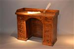 A charming ash and pine kneehole desk.