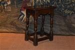 A high Charles I oak joint stool.