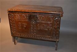 A small and rare boarded chest dated 1624.