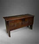 A late 17th century boarded chest .