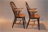A rare pair of signed Windsor armchairs.