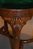 A Irish George I walnut oval stool.