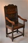 An impressive Charles I oak armchair.