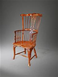 A George III Windsor comb back armchair.
