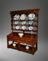 A small 18th century potboard dresser and rack.