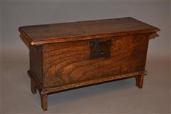 A very small Queen Anne elm child's coffer.