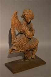 A weathered 15th16th century oak angel.