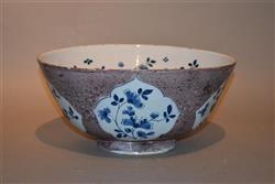 A large early 18th century English delft bowl.