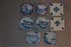 A collection of fifteen 18th century delft tiles.