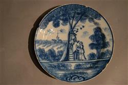 A charming 18th century delft apple picking plate.
