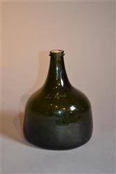 An early 18th century mallet wine bottle.