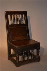 A rare James I walnut child's chair.