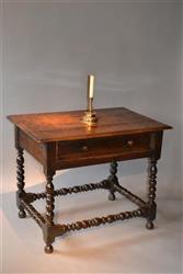 A Charles II walnut side table.