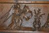 A very fine walnut depiction of The Annunciation.