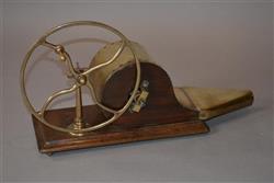 A  19th century wheel driven bellows.