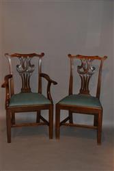 A set of two + six Country Chippendale oak chairs.