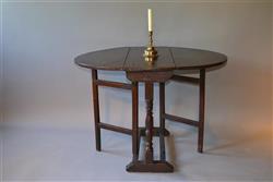 A small William and Mary oak gateleg table.