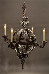 An 18th century wrought iron chandelier.