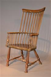 A mid 19th century Scottish comb back armchair.