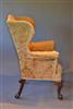A small George II wing back armchair.