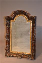 A rare Queen Anne carved walnut frame mirror.