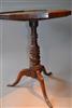 A George III oak tripod table.