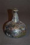 A small  early 18th century onion wine bottle. 