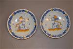 A pair of early 18th century faience dishes.