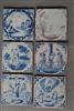 A collection of 18th century English delft tiles.