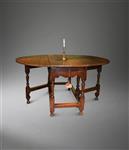 A William and Mary oak gateleg table. 