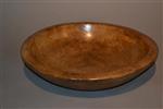 A George III sycamore dairy bowl.