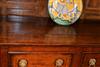 A George III oak dresser base of rare form.
