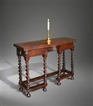 A charming 17th century oak writing table.