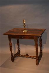A mid 18th century French walnut side table.