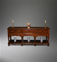 A mid 18th century oak dresser base.