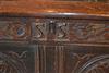 A Charles I oak chest.