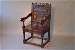 A North Country Charles II oak armchair.