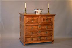 A Queen Anne walnut chest of drawers.