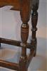 A high Charles I oak joint stool.