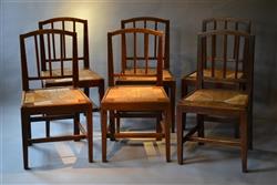 A genuine set of six late Georgian oak chairs.