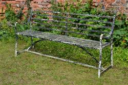 An elegant antique garden bench. 