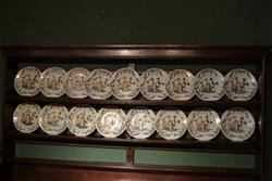 A rare set of 14 Lambeth delft polychrome plates.