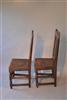 A pair of Queen Anne oak chairs.