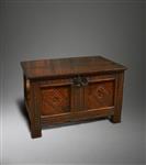An exceptionally small mid 17th century oak chest.