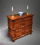 A James II yew wood chest of drawers.
